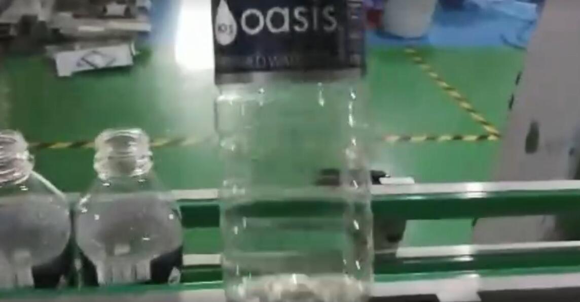 旋转式热熔胶贴四方瓶水